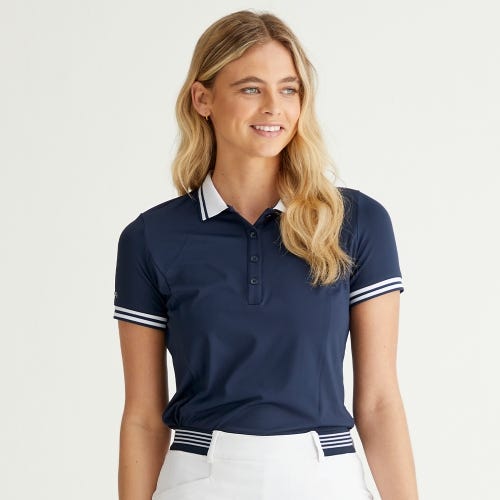 Ali golf polo shirt in navy white womens lifestyle front