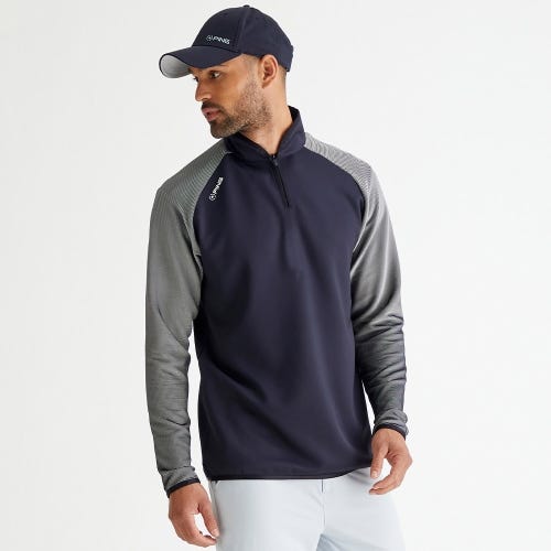 Strio golf midlayer in black white mens lifestyle front