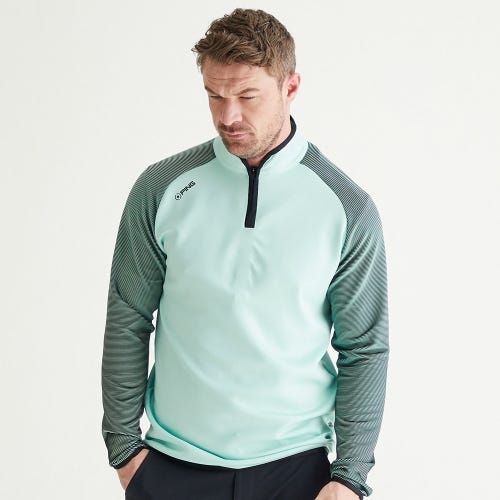 Strio golf midlayer in misty green black mens lifestyle front